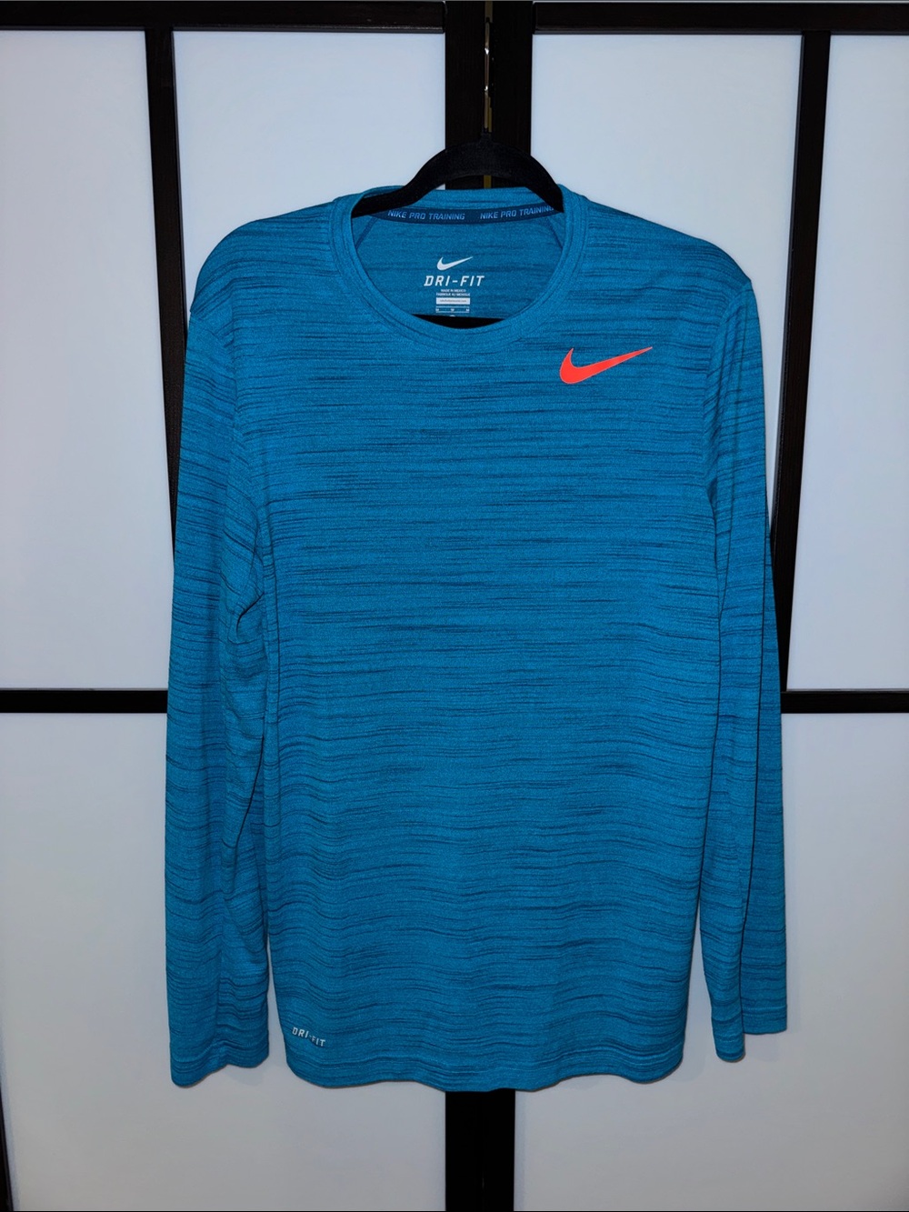 Nike Men’s Long Sleeve Dri-FIT Shirt in Teal with Orange Swoosh - Size M